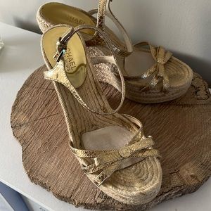 Michael Kors gold wedges